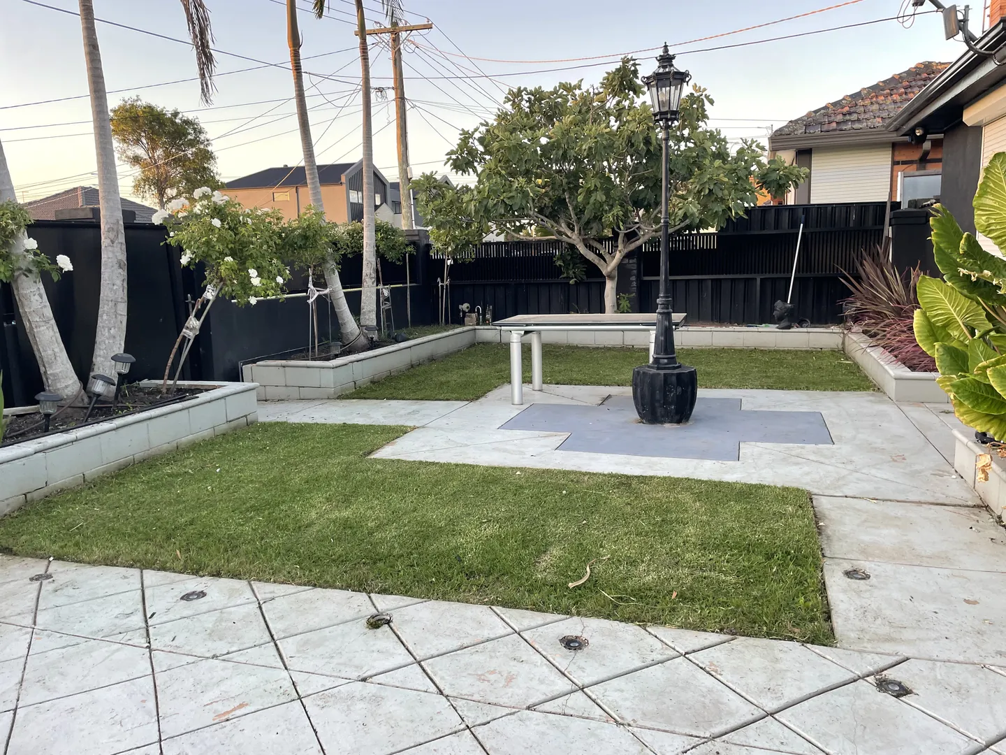 A residential frontyard in Altona Meadows featuring a small, freshly cut lawn